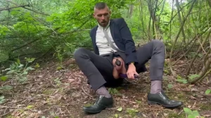 In suit and tie and sheer socks playing with my male-pussy just after