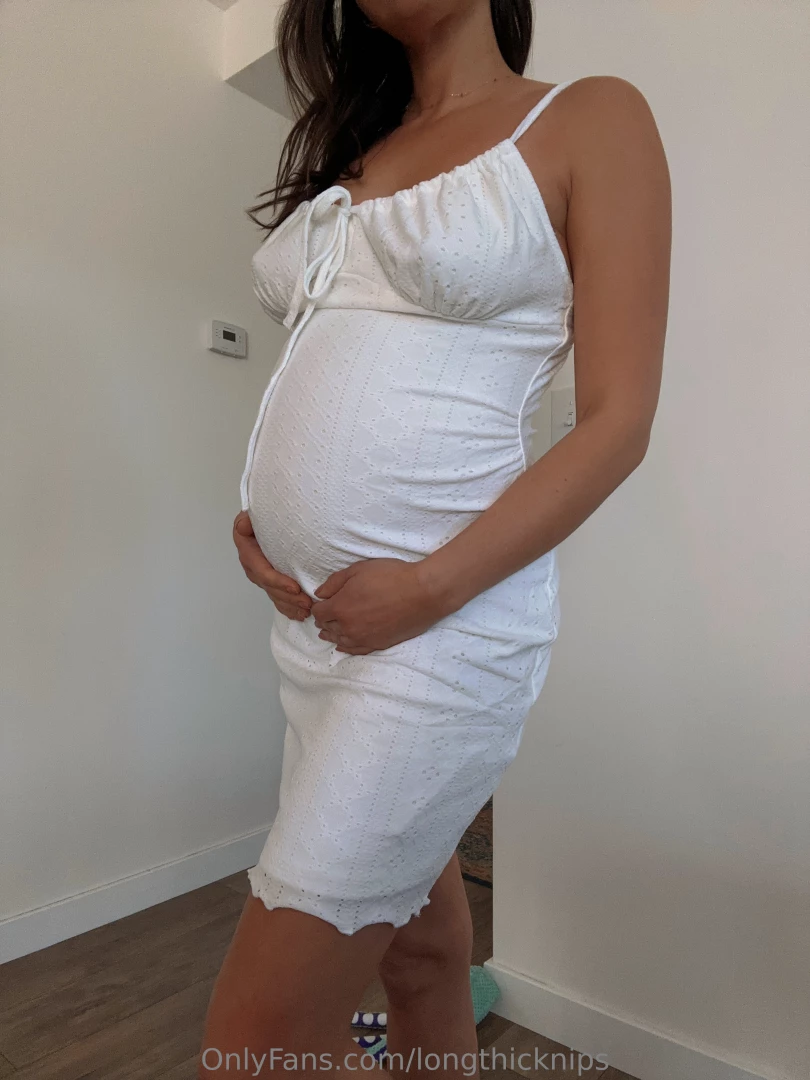 I love the way this dress hugs my bump and new curves but i love 