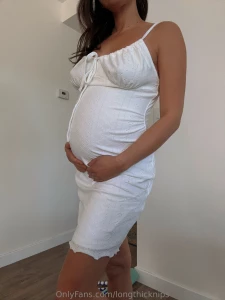 I love the way this dress hugs my bump and new curves but i love