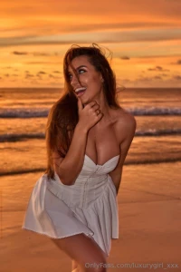 This morning light on the beach hides its secrets in a white dress part 2