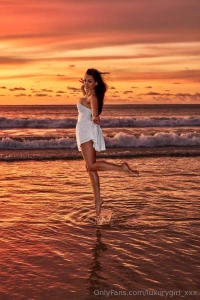 This morning light on the beach hides its secrets in a white dress part 4