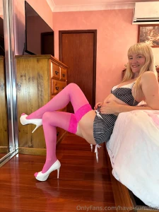 Pink stockings high heels just a hint of trouble wrapped in charm i