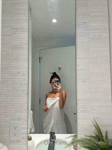 Just got out the shower still wet should i stay in this towel or let