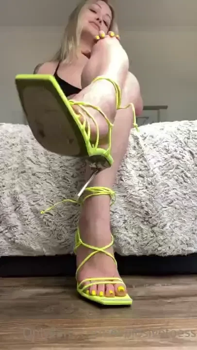 Neon high heels and neon toes removal dangle close up vid 