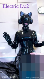 A jet-black rubber doll with only two tiny holes for breathing through