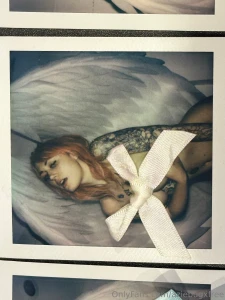 I prefer the photo without the bow but that s just me