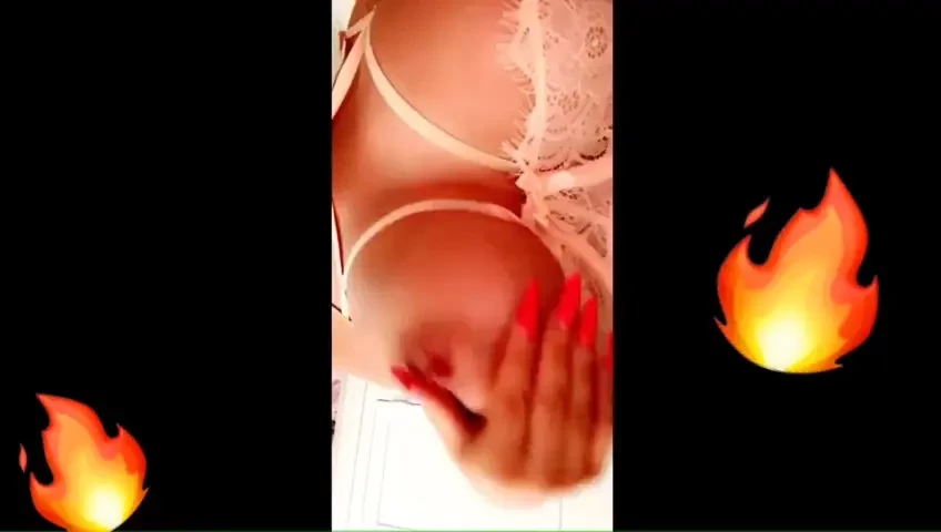 In sexy lingerie playing with toys 
