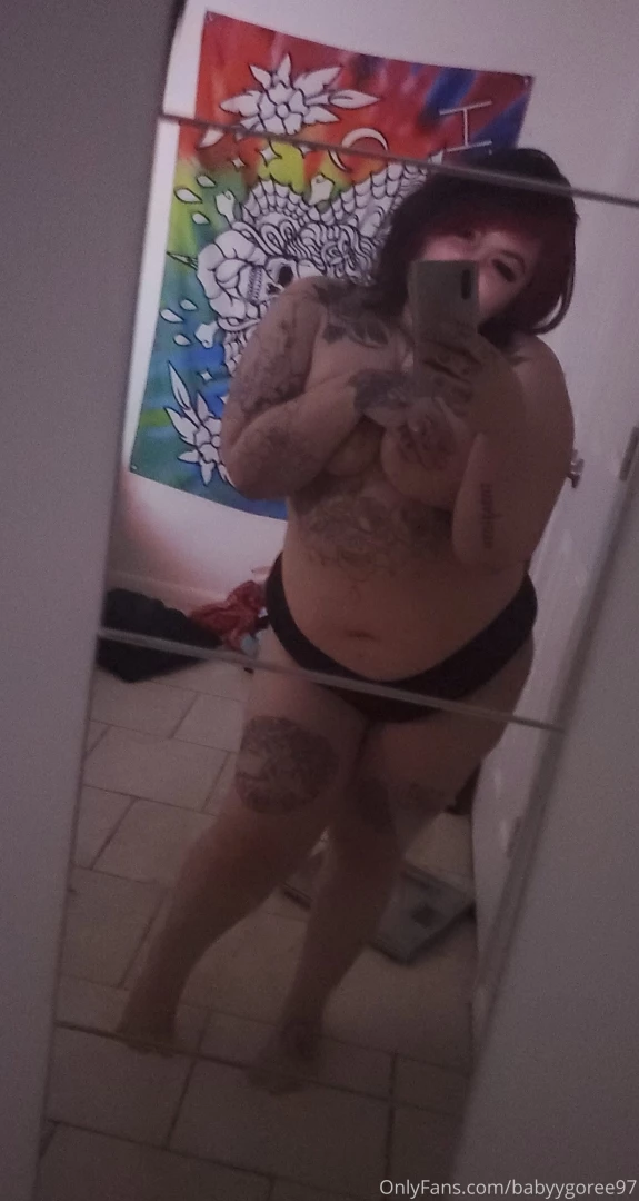 Just some low quality topless mirror pics 