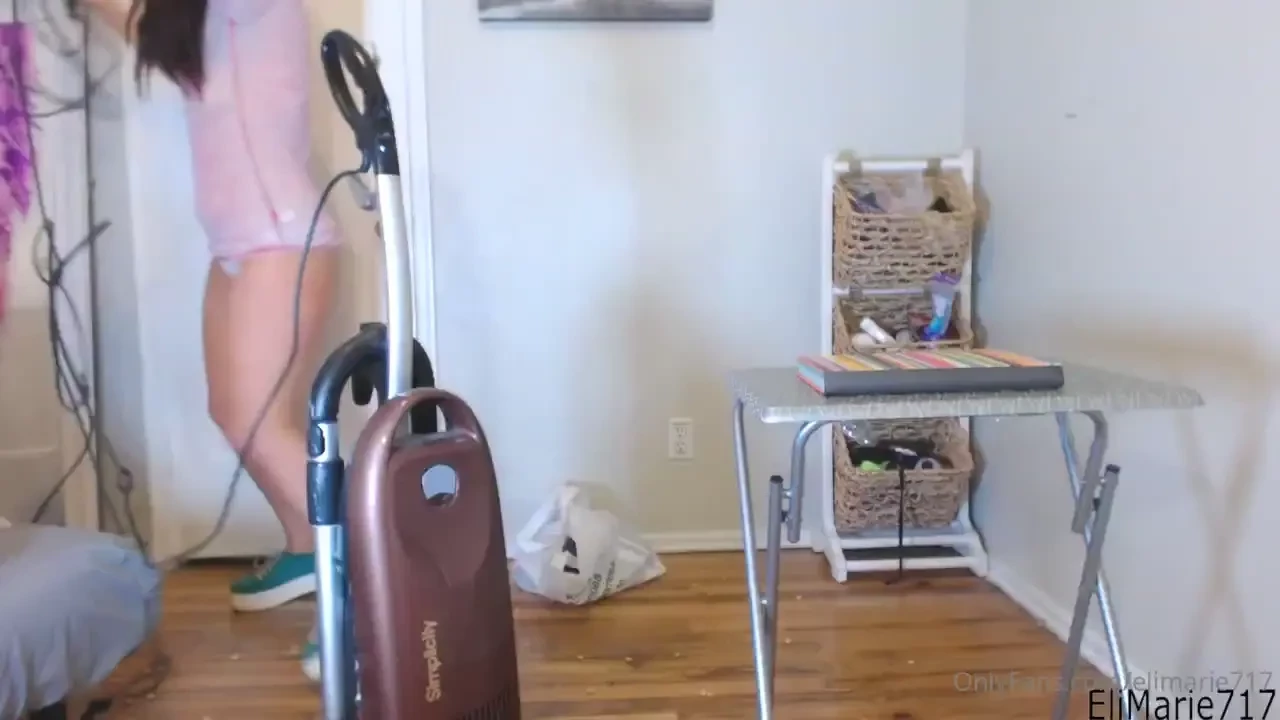 Ever wanted to spy on a hot chick vacuuming cheerios up off a wooden 