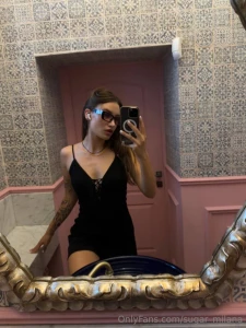 A little black dress stylish sunglasses and confidence are the perfect