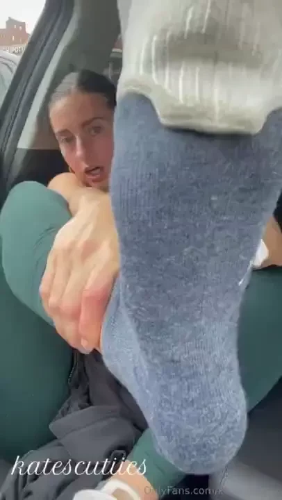 Taking off my stinky socks in the parking lot after a super sweaty 