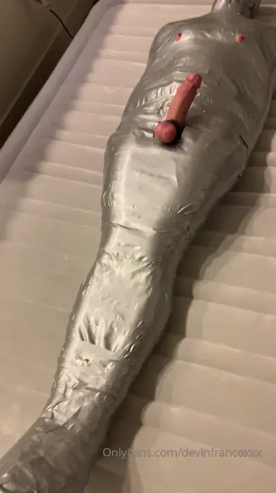 Fully bound and encased in duct tape completely restricted senses 