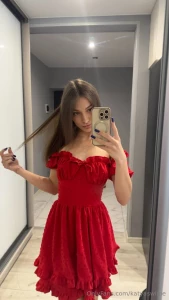 The red dress says more than words it whispers of passion and desire