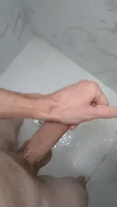 Stroking my big fat cock and flexing in the shower until i blow a load part 1 
