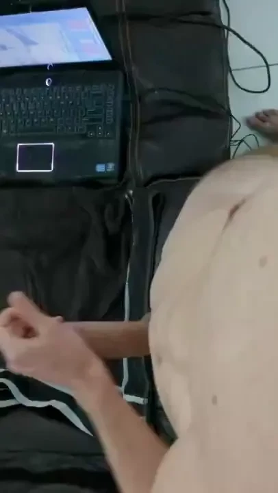 Busting a nice fat nut all over a black towel 