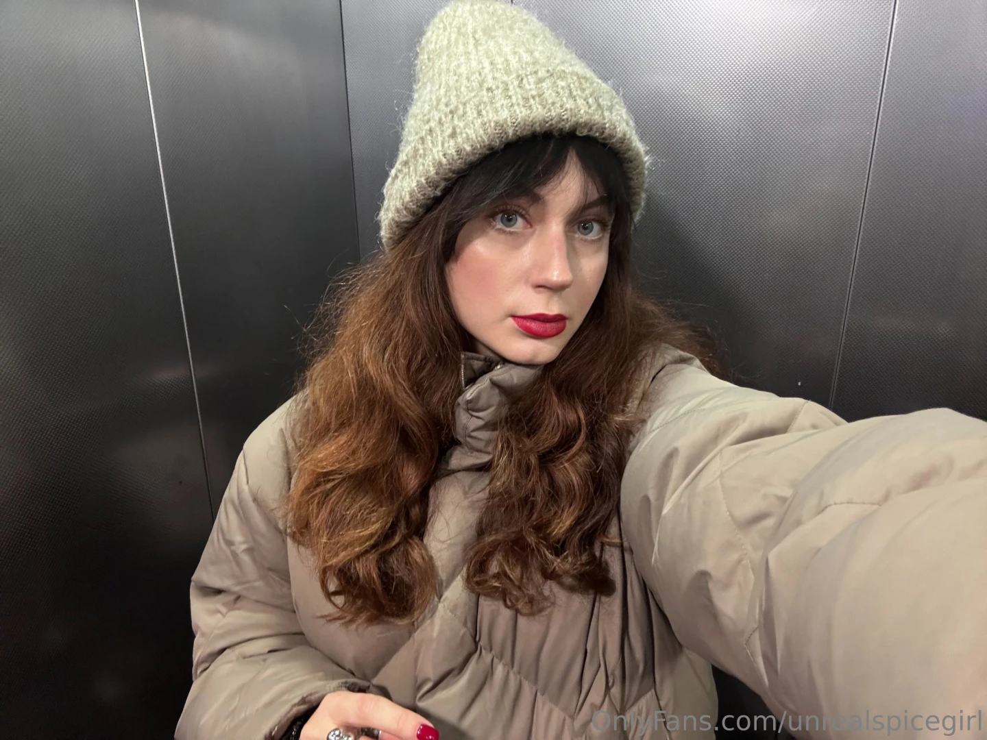 Winter morning hat on my head and now the frost outside the window 