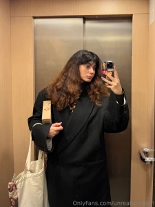 When duty calls even in the elevator you ve got to stay stylish but