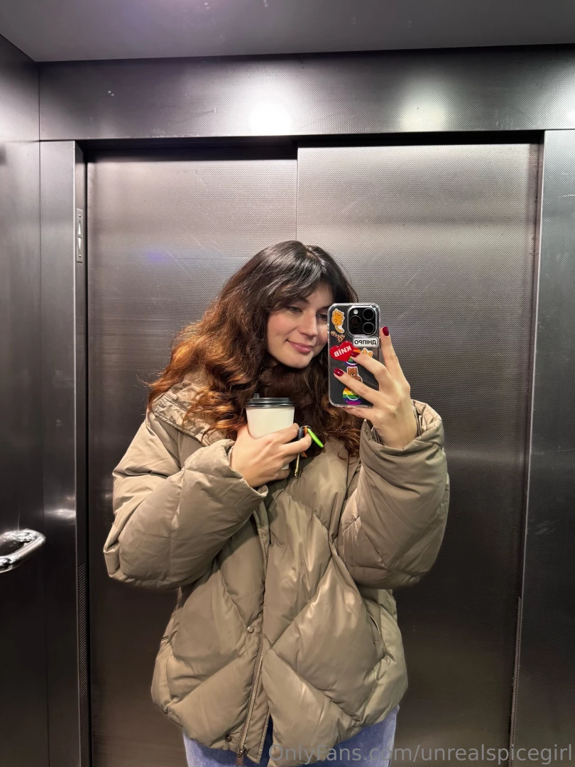 In the elevator dreaming of blooms wishing for spring to chase away 