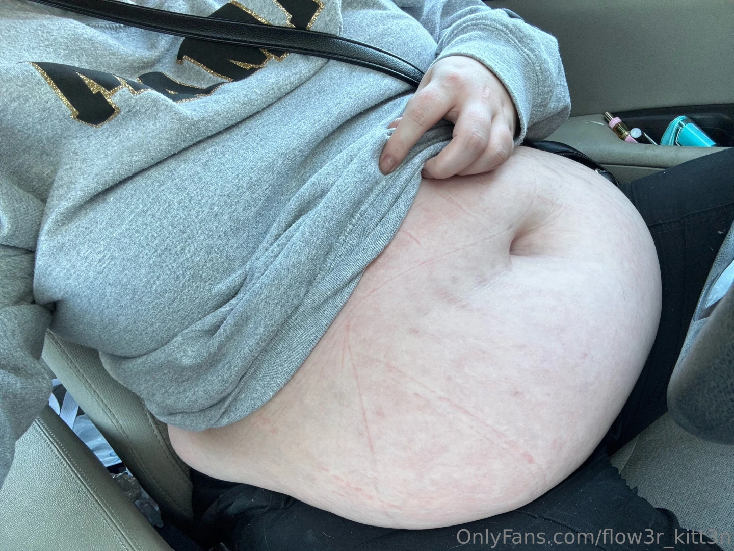 Long day at work means car belly photos 