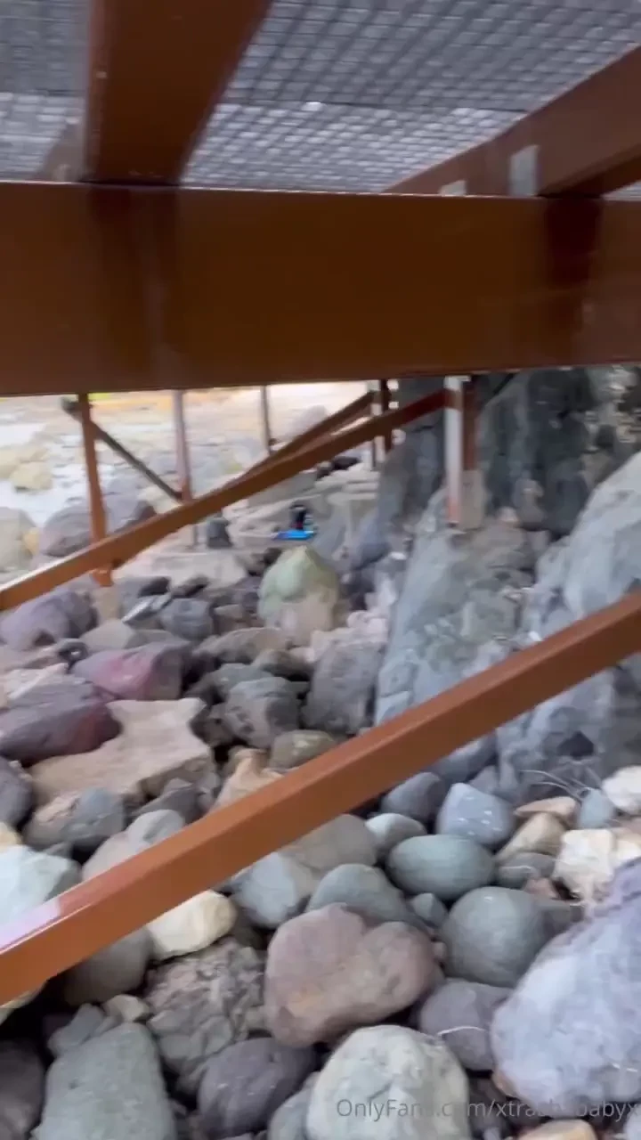 Hiding underneath the see-through boardwalk and bouncing on my dildo 