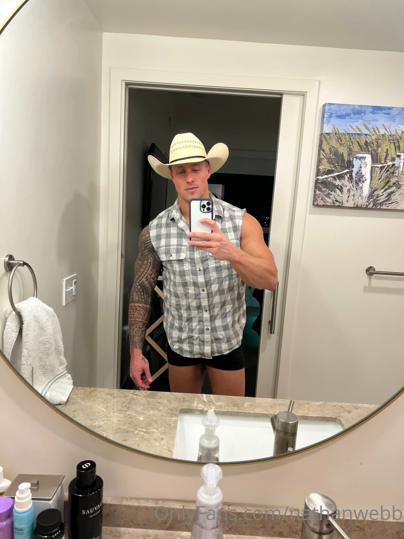 What do you like more my cowboy hat muscles or my bulge popping out 