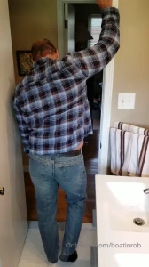 Stripping slowly out of tight jeans and flannel to briefs and then