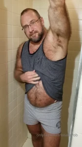 Stripping out of gym clothes to a jock then a hot soapy shower