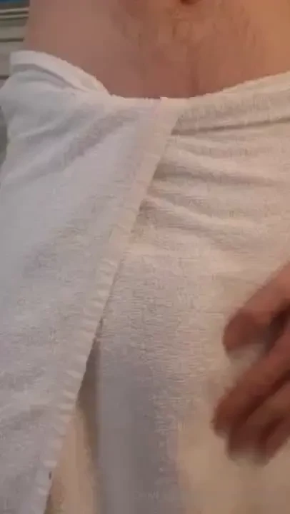 Revealing hung cock out of the shower 