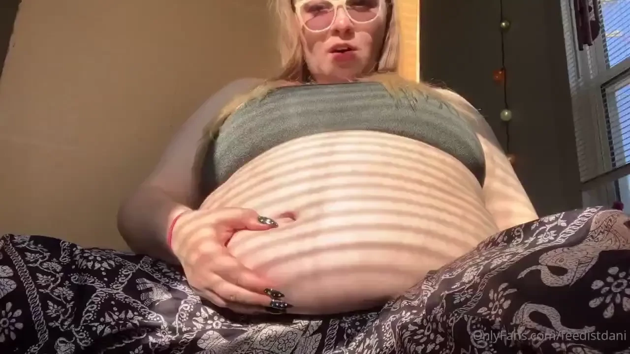 Oiling up my stuffed belly the pain of inhaling 1700 calories in ten 