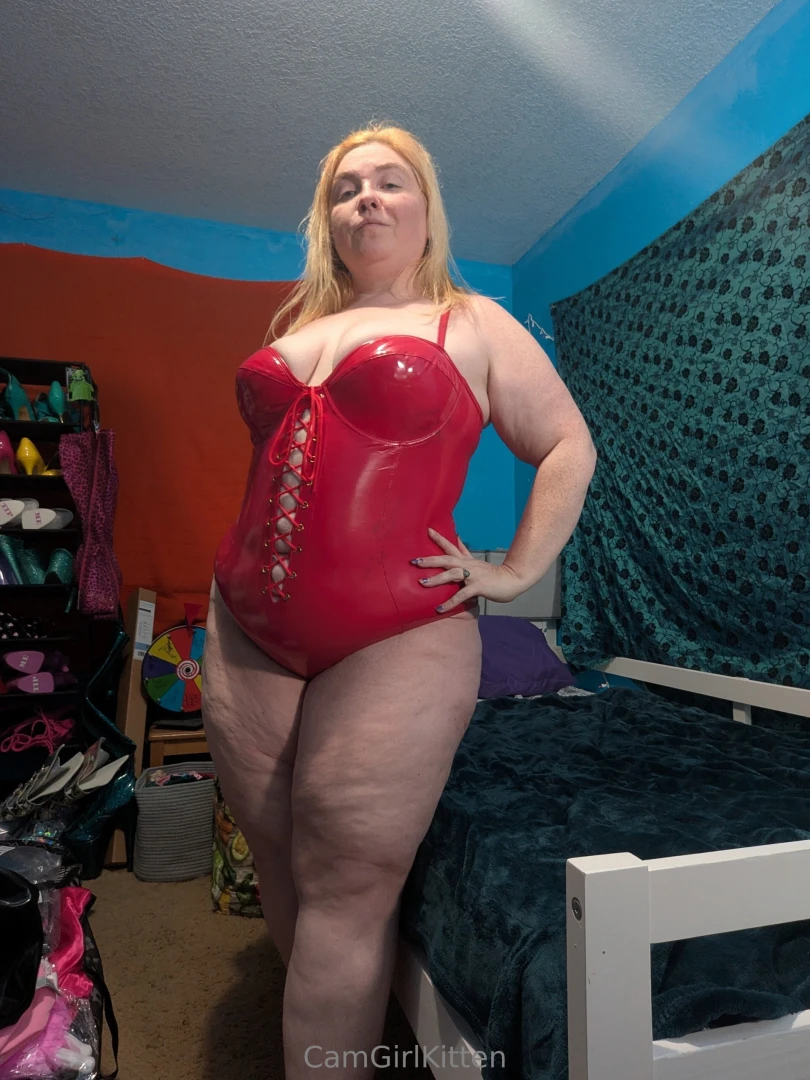 Thought you d like another peek at the red vinyl lace-up bodysuit and part 1 