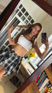 Back to my uni girl era just a plaid skirt a white top and that