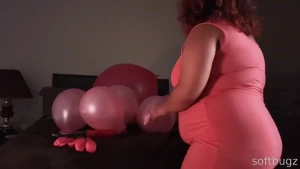 Watch bug as she sucks up the air of 10 medium sized balloons and one