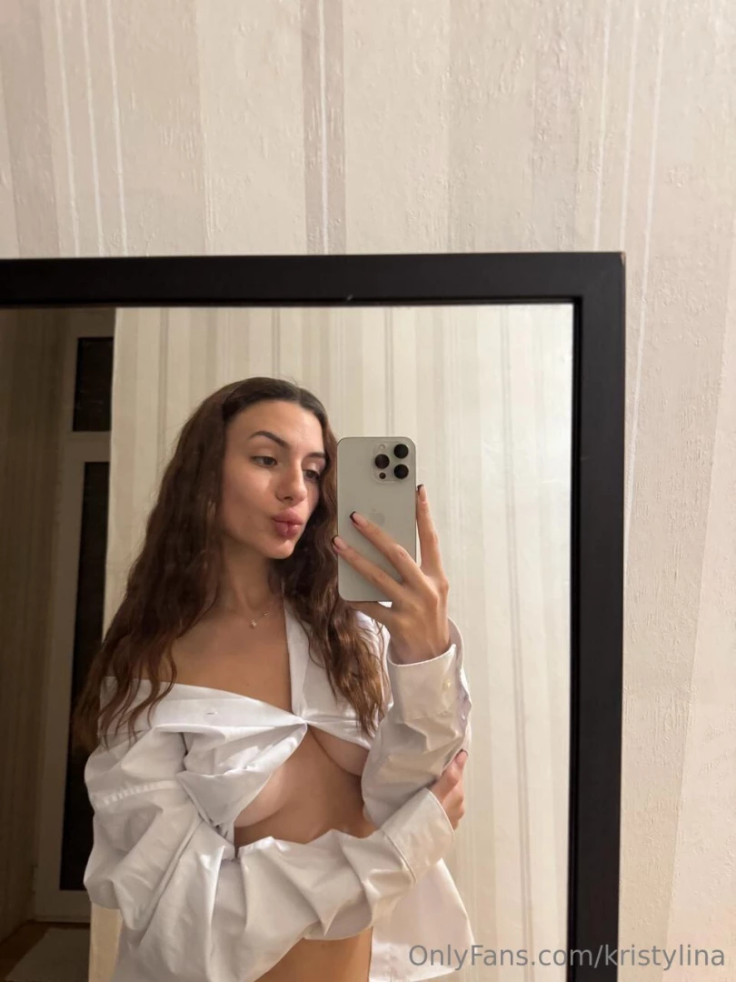 Button-up or busting out this tight little polo is working overtime to 