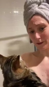 More kitty shenanigans just trying to get out of the shower and she is