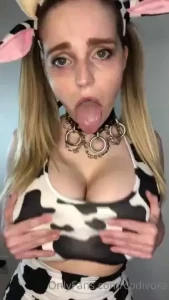 Showing off my wet tongue and mouth while struggling to pull my tits
