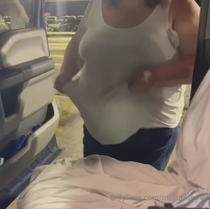 Removing the bra in the airport parking garage