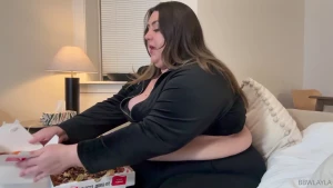 Stuffing my face with a huge meal of a pizza wings with buffalo and