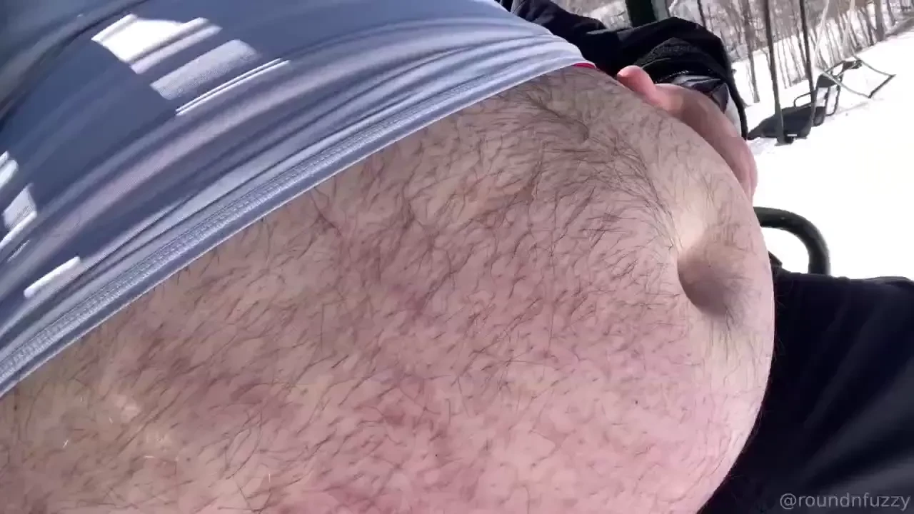 Full frontal ski belly belly overhanging the safety bar 