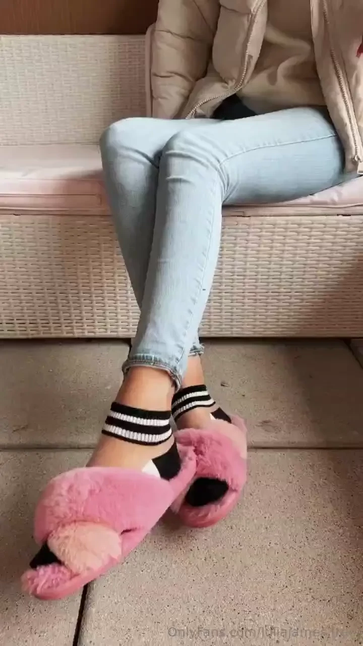 Enjoying my cool socks with pink slippers those socks are really 