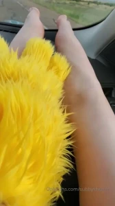 Playing with my bare feet as we pull into town damn does this mean i