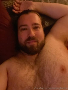Cosy bear in bed who says hibernation is just for the winter