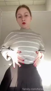 Striptease i dance and gradually undress taking off my jacket skirt