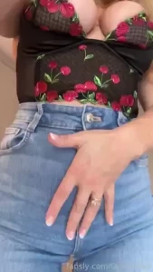 High waisted jeans and a cute bralet covered in cherries what more