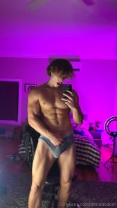 Mirror shot abs and biceps flexed briefs snug with this big fat cock