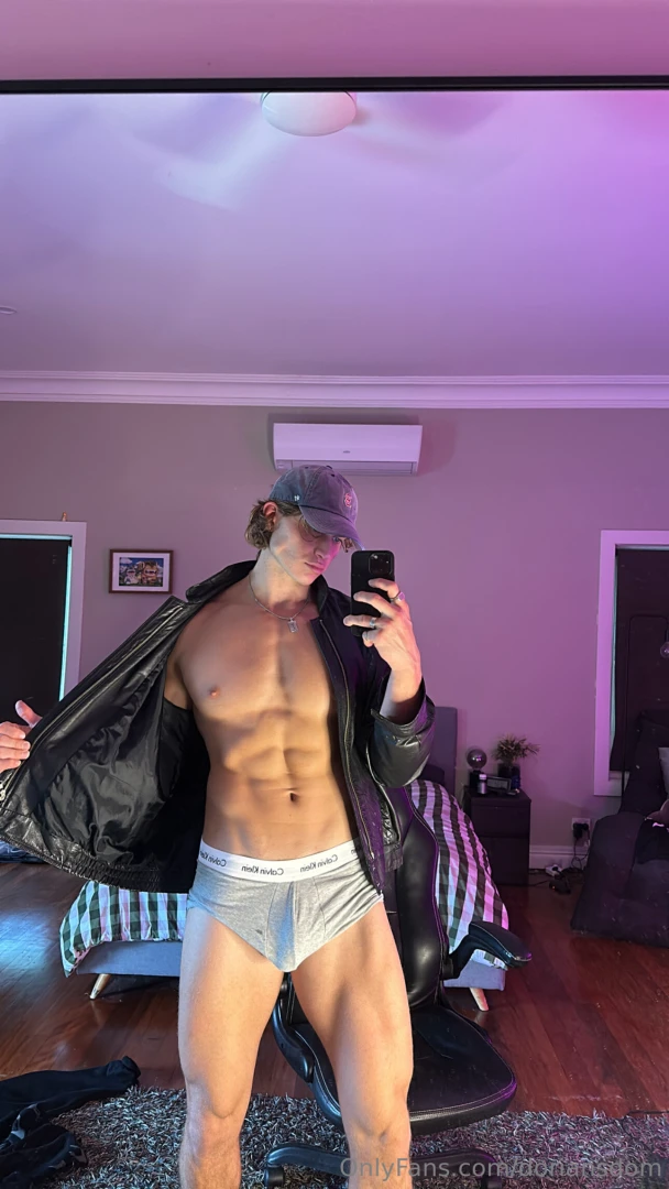 Leather open chest bare abs tight and this boxer barely holding it 