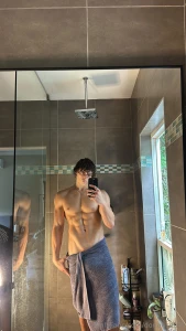 Fresh out the shower towel wrapped low and barely holding things down