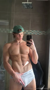 Mirror shot in the bathroom just a cap up top and briefs down low
