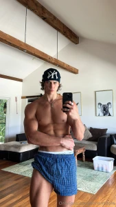 Catching the flex in the mirror biceps pumped abs tight and this hard part 1