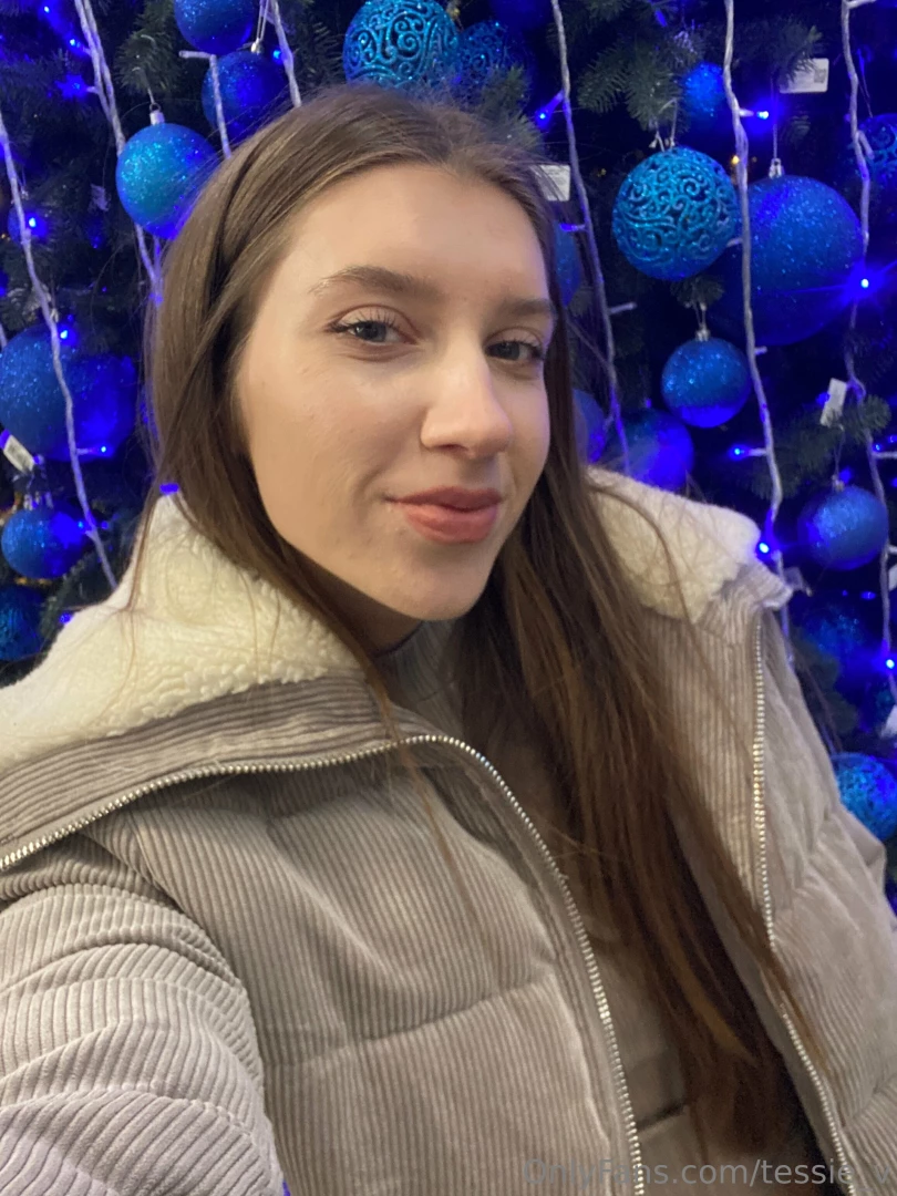 Embrace the festive magic with me as i stand beside a grand and 