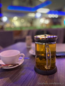 Savoring a cozy moment with a delightful cup of tea in the warmth of a